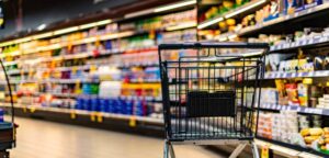 Retail buyer assessing shelf layout and product placement