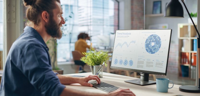 Small business owner reviewing retail performance data and insights