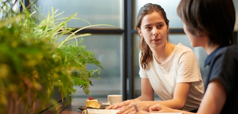 Brand founder having a relaxed meeting with a buyer