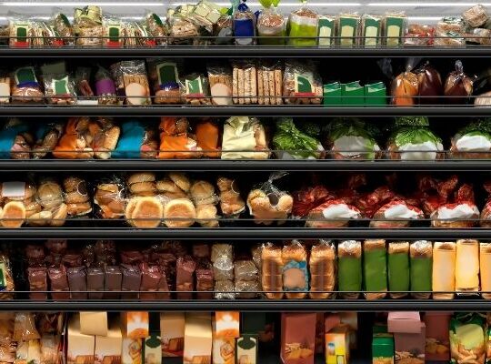 Retail shelf showing colourful limited editions beside consistent core products.