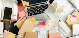 Notebook and tea on desk symbolising marketing planning and direction