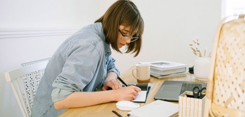 Notebook showing marketing decisions written down