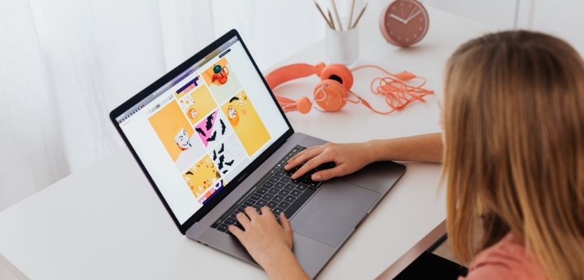 Business owner juggling multiple marketing tasks such as blogging, social media and email marketing.