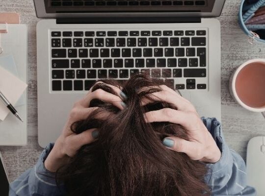 Business owner stressed by marketing feeling overwhelmed and distracted