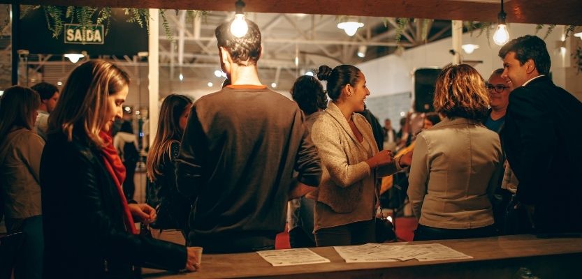 A group of people at an informal networking meeting